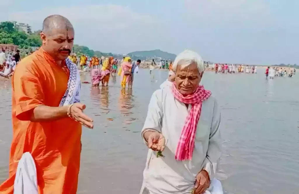 Tarpan water offering ritual at a sacred ghat